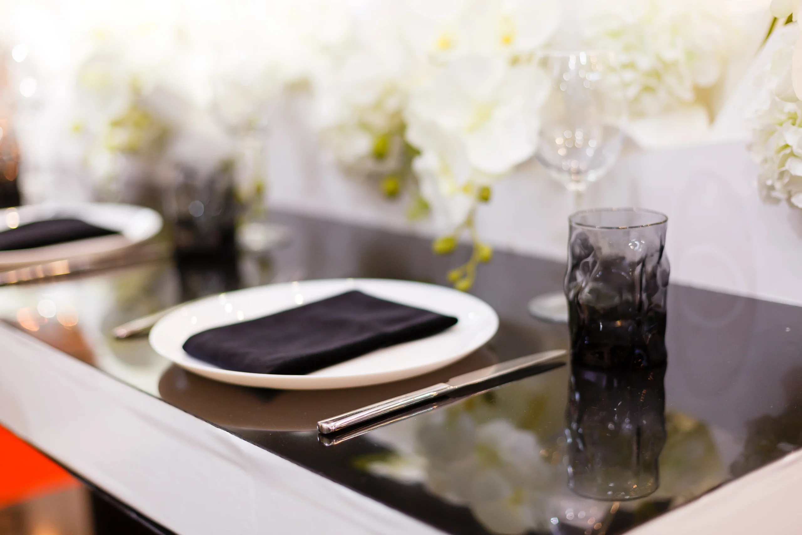 Elegant table setting with black napkin